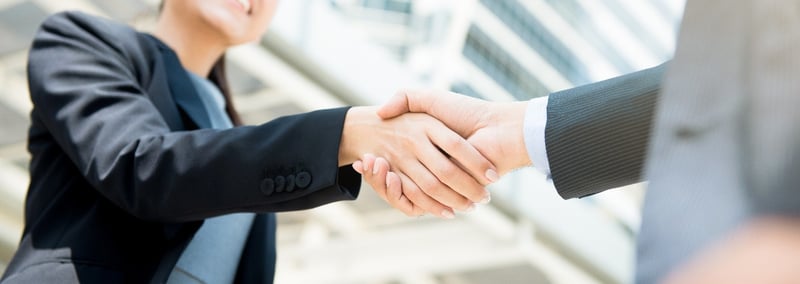 Why work microsoft partner-Man and woman walking with device-PI