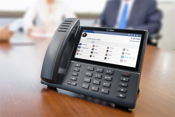 mitel pbx phone sitting on a table