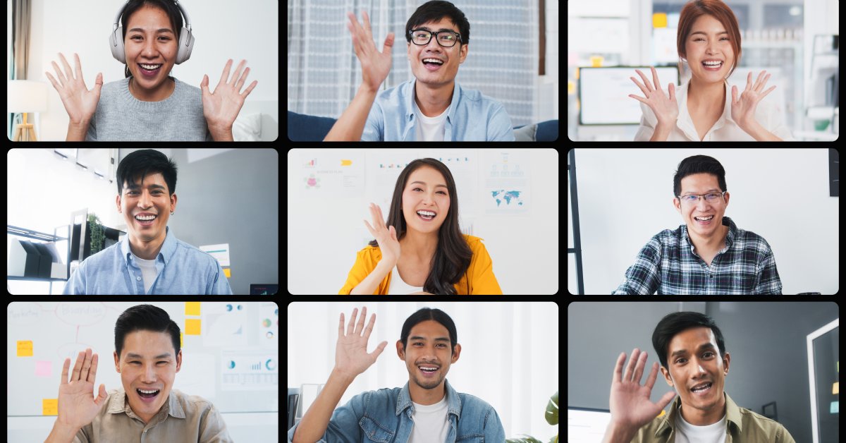 A video conference with nine participants in business casual clothes smiling and waving at their cameras.