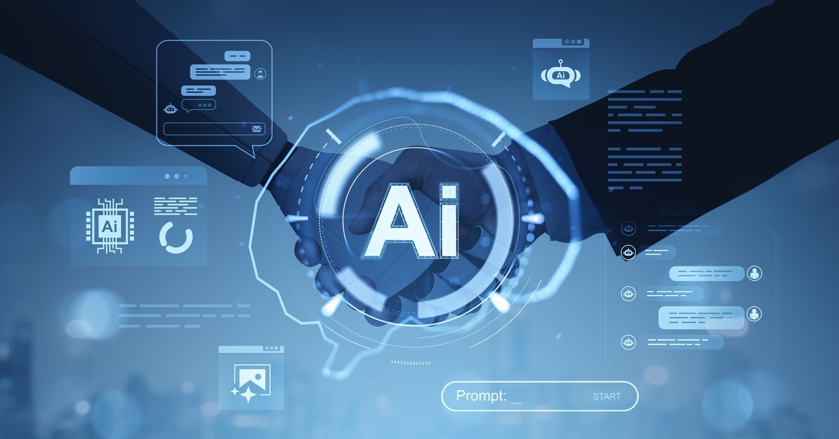 A robot arm and a human shaking hands. Above them is a graphic of a brain with the word "Ai" on it.