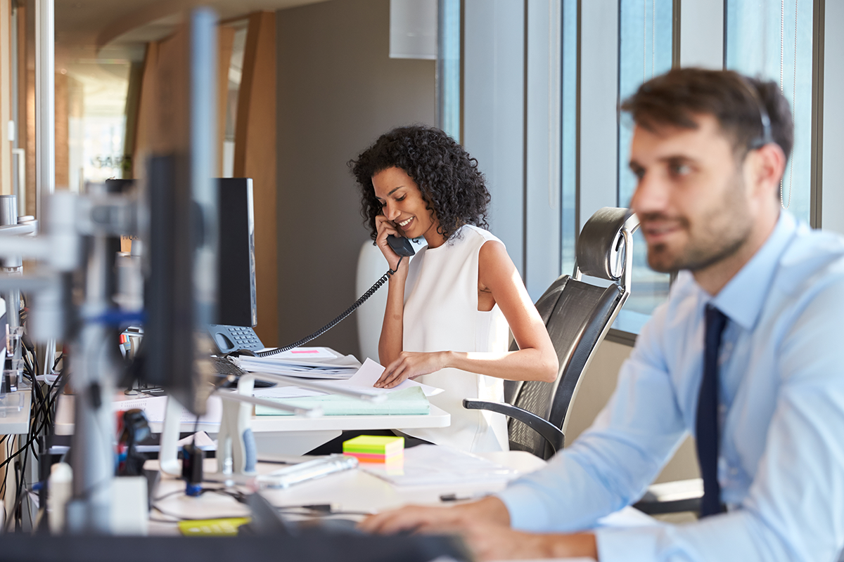 woman-on-desk-phone